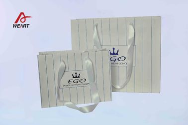 China White Silk Ribbon Cute Paper Bags Hot Stamping Finish CMYK Surface Embossed Logo supplier